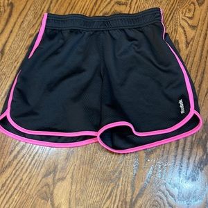 Reebok athleisure shorts. Black and pink. Size M (10-12)